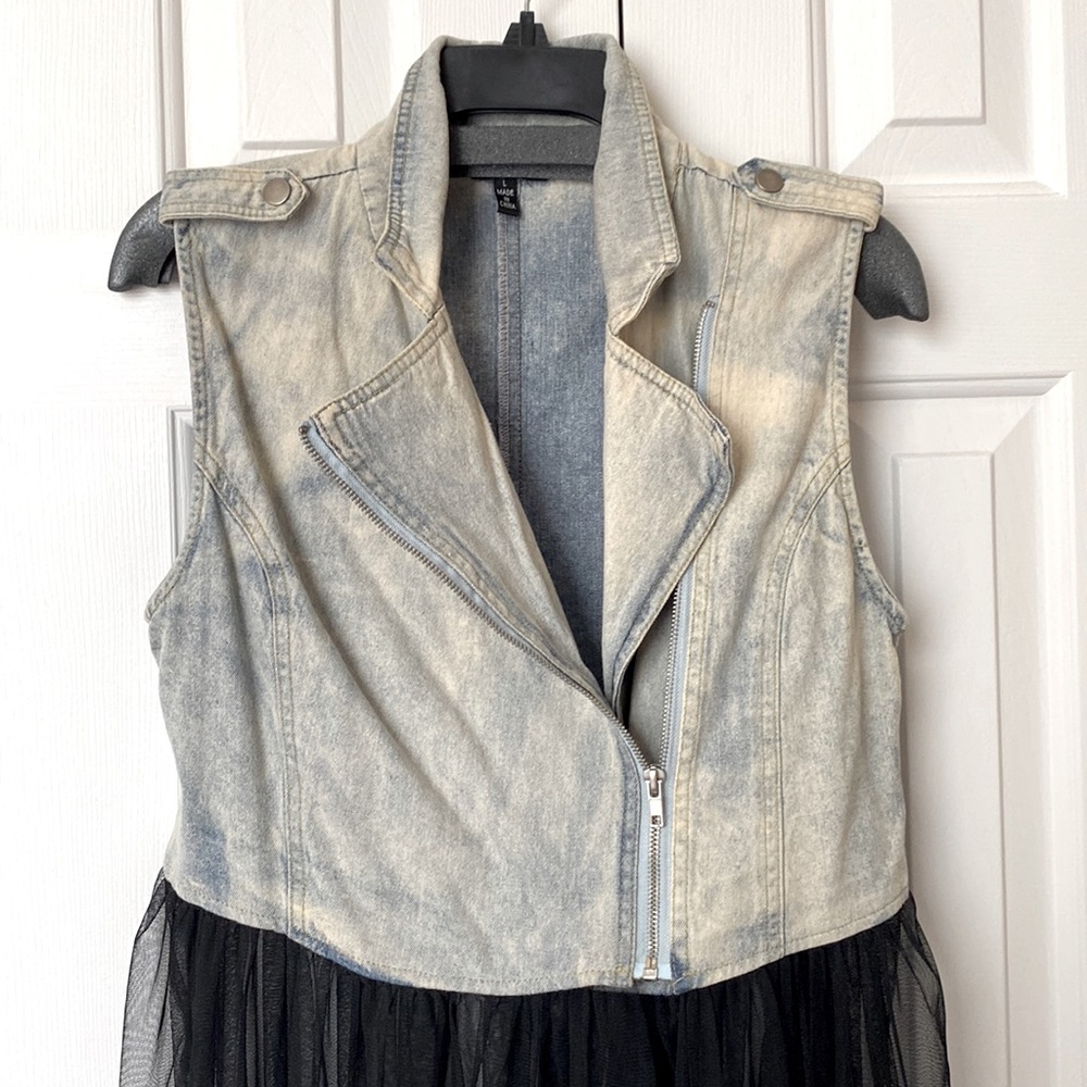 Nice denim vest with tulle at the bottom. Size L and worn once.
